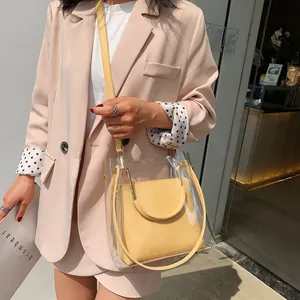 Summer clear PVC jelly bag with yellow inner pouch and metal handle for women