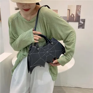 Gothic black bat-shaped handbag with white spider web embroidery for Halloween