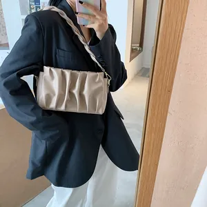 Minimalist beige PU leather shoulder bag with pleated design and braided strap