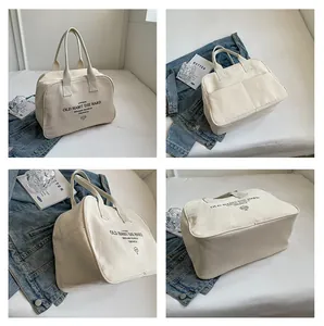 Detailed views of a large canvas tote bag with retro lettering and back utility pockets