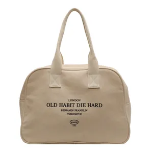Large capacity beige canvas tote bag with black letter print for casual commuting