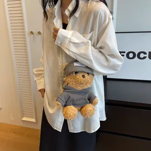 Cute brown plush bear crossbody bag with grey hoodie and stylish metal chain strap