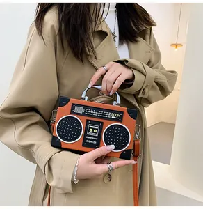 Borsa a tracolla retrò creativa arancione con manico in metallo e quadrante vintage