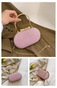 Detailed views of pink glitter evening clutch with golden bow clasp and metal handle