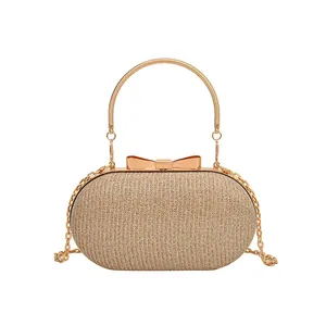 Sparkling champagne gold glitter clutch bag with metal ring handle and chain strap
