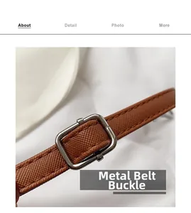 Close-up of brown leather strap with fine texture and silver square metal buckle