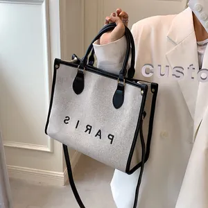 Bolso tote de lona con ribete de cuero negro y estampado de París, para hombro o mano
