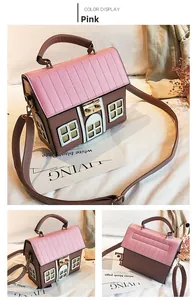Detailed views of the house-shaped crossbody bag in pink and brown with gold metal clasp