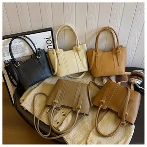 Detailed collection of textured leather bucket bags in five colors with gold hardware