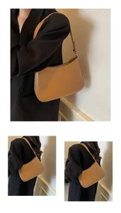 Detail of camel PU leather half-moon shoulder bag with adjustable metal buckle strap