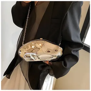 Macro shot of silver acrylic handbag featuring unique wavy texture and metallic chain