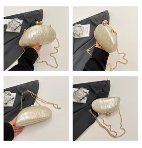 Detailed views of acrylic evening clutch featuring mother-of-pearl texture and gold chain