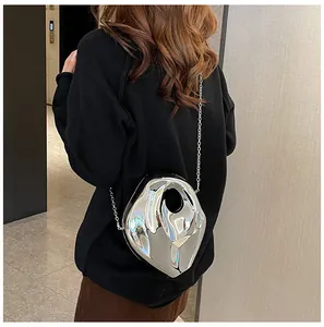 Silver mirror acrylic clutch bag with a sleek metallic finish and thin chain strap