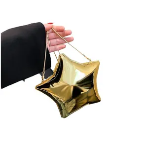 Luxury gold star shaped evening clutch bag with chain strap and mirror finish surface