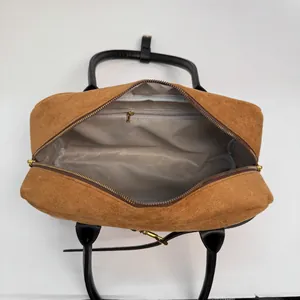 Overhead view showing large interior capacity and zipper pocket of brown suede tote bag