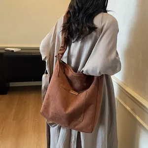 Retro brown frosted leather tote bag for women with knot detail and front pocket