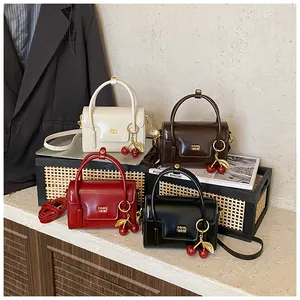 Retro mini leather square handbags in four colors with cherry charms and shoulder straps