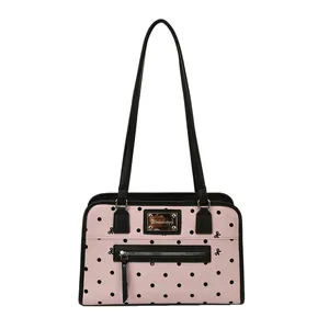 Sac fourre-tout rose à pois avec nœuds noirs et doubles bandoulières élégantes