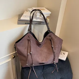 Brown suede tote bag with fringe details and large capacity for women commuting