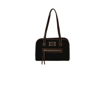 Sac fourre-tout noir rétro avec garniture en cuir marron et détails métalliques