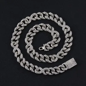 Detailed close-up of 19mm iced out Cuban link chain with crystal box clasp and silver finish