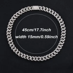 Close-up of 15mm silver Cuban link chain with iced out rhinestones and size labels