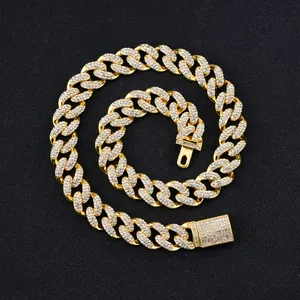 Hip hop 15mm golden Cuban link necklace encrusted with white rhinestones on black background
