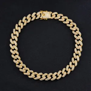Close-up of iced out 19mm gold cuban chain with rhinestone pave and secure square clasp