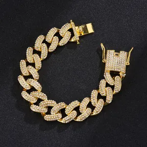 Close-up of 19mm gold-plated cuban link chain featuring handset micro pave rhinestones