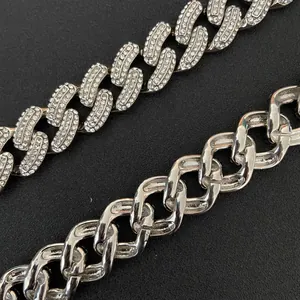 Close-up of 19mm hip hop cuban link chain showing iced out rhinestones and silver finish