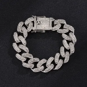 Detail of 19mm heavy iced out Cuban link chain with sparkling rhinestones and secure clasp