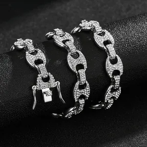 Close-up of diamond-encrusted silver mariner link necklace with secure box clasp