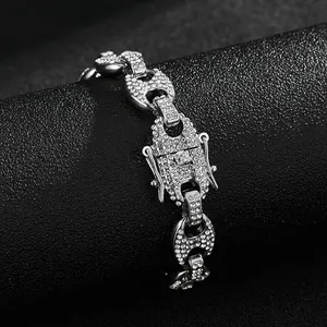 Close-up of hip hop coffee bean link bracelet with pavé diamonds and a secure buckle clasp