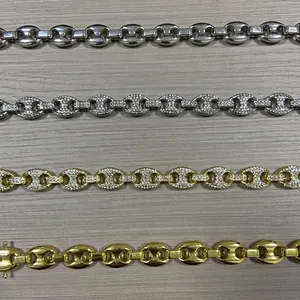 Detailed comparison of coffee bean link bracelets in silver and gold with crystal accents