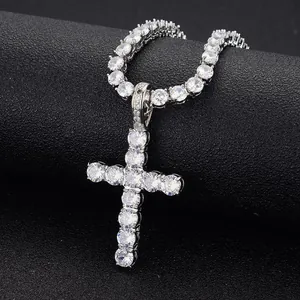 Silver hip hop tennis chain featuring a mini zircon cross pendant on black texture