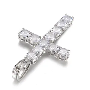 Silver hip hop cross pendant featuring sparkling zircon pavé setting on white background