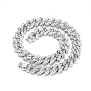 Men's 16mm iced out silver Cuban link chain with baguette cut zircons in a spiral layout