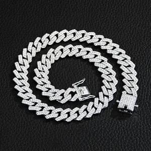 Close-up of 13mm silver-tone Cuban link chain with pave-set zircon and secure box clasp