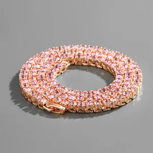 Rose gold tennis chain necklace with round-cut pink zircons and secure folding clasp