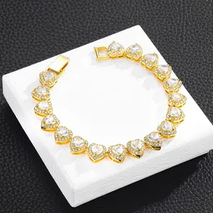 Golden hip hop Cuban link bracelet with iced-out heart-shaped white crystals