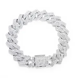 Close-up of 15mm silver iced out Cuban link necklace with rhinestone pavé buckle