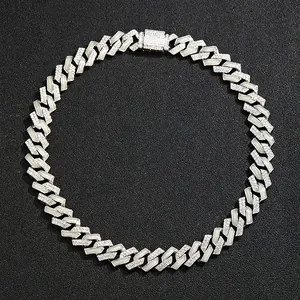 Detailed close-up of 15mm luminous Cuban link chain with pavé diamonds and white enamel