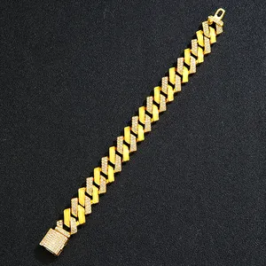 Macro detail of gold-plated Z-link chain necklace with micro-pave crystals on black leather