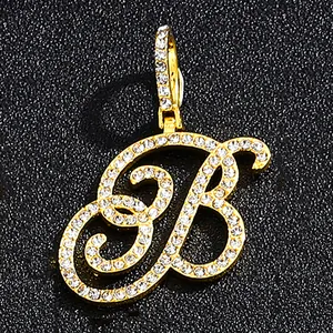 Iced out gold plated cursive letter B pendant with zircon stones in hip hop style