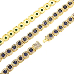 Luxurious gold-plated cuban chain link bracelet with deep blue sapphire-like stones