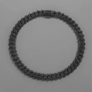 Detail of black cuban link chain with paved black zircon stones and buckle