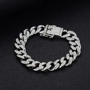 Macro view of silver-tone Miami Cuban link chain with encrusted white rhinestones