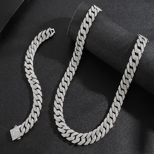 Iced out silver Cuban link chain necklace and bracelet set with white zircon stones