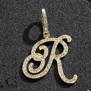 Iced out gold cursive letter R pendant with glittering micro-pave crystals