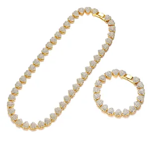 Set di gioielli hip hop in oro con maglie a cuore e strass per uomo e donna